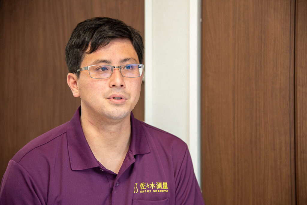 測量会社社員